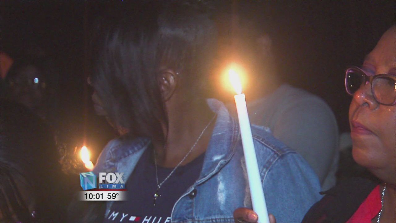 Family and friends hold a prayer vigil for Gregory Cooper